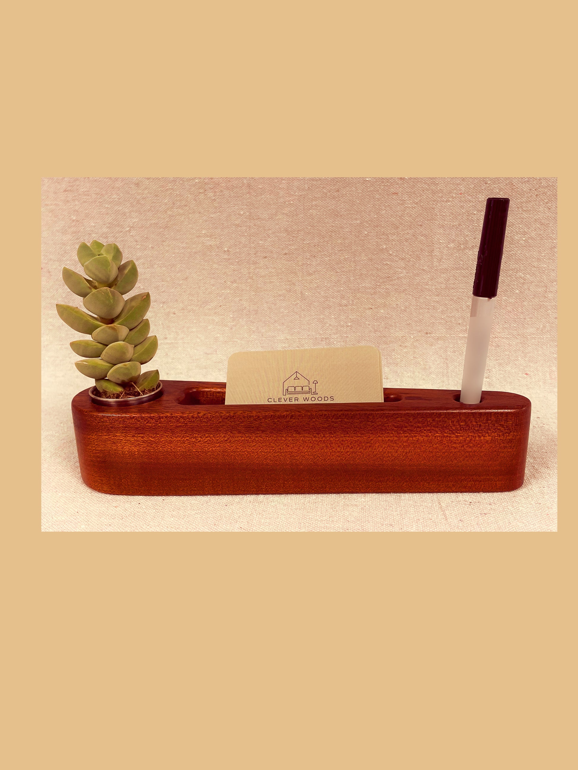 Solid sapele wood desk caddy with stainless planter cup, card slot, and pen holder