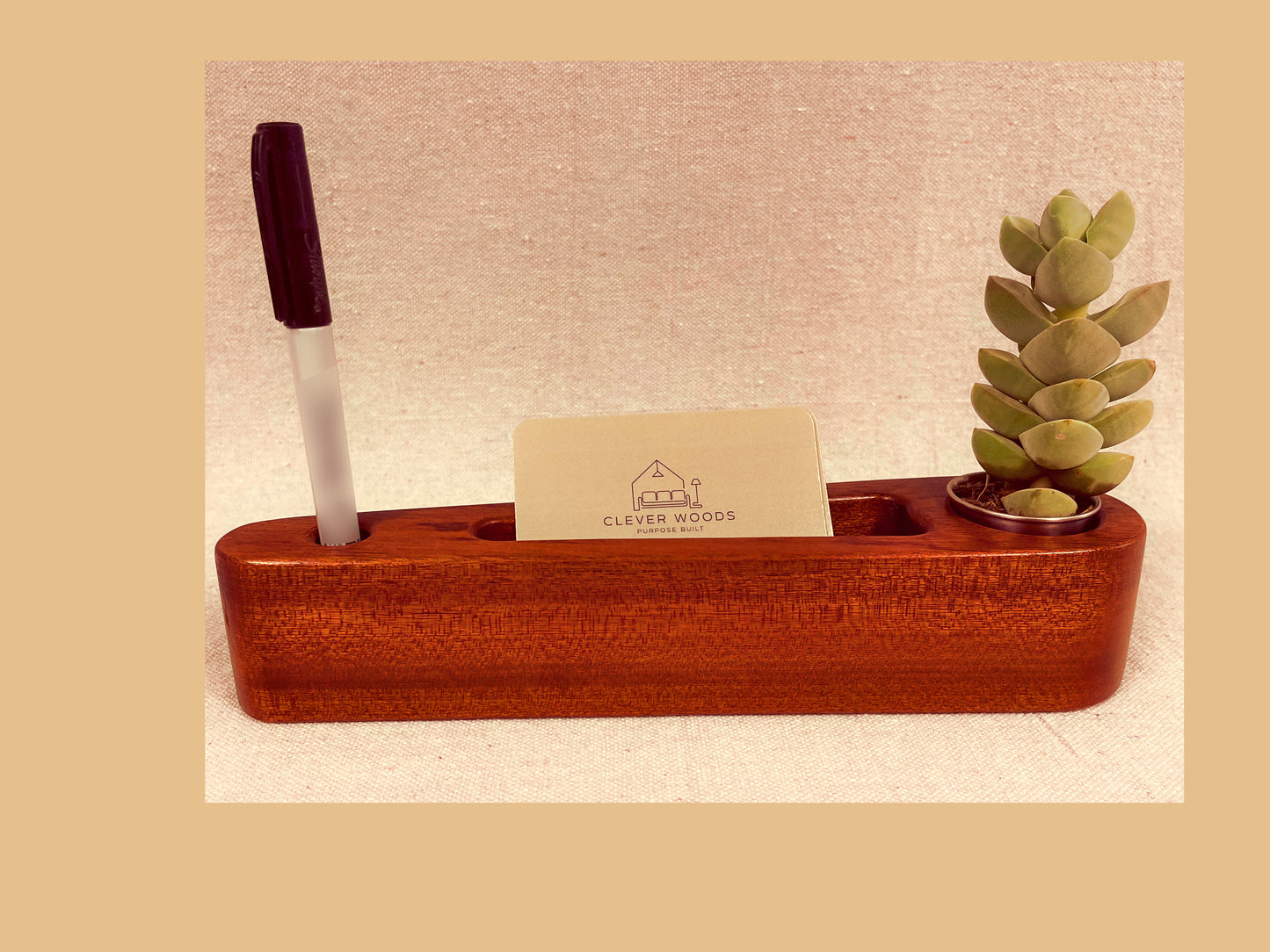 Solid sapele wood desk caddy with stainless planter cup, card slot, and pen holder