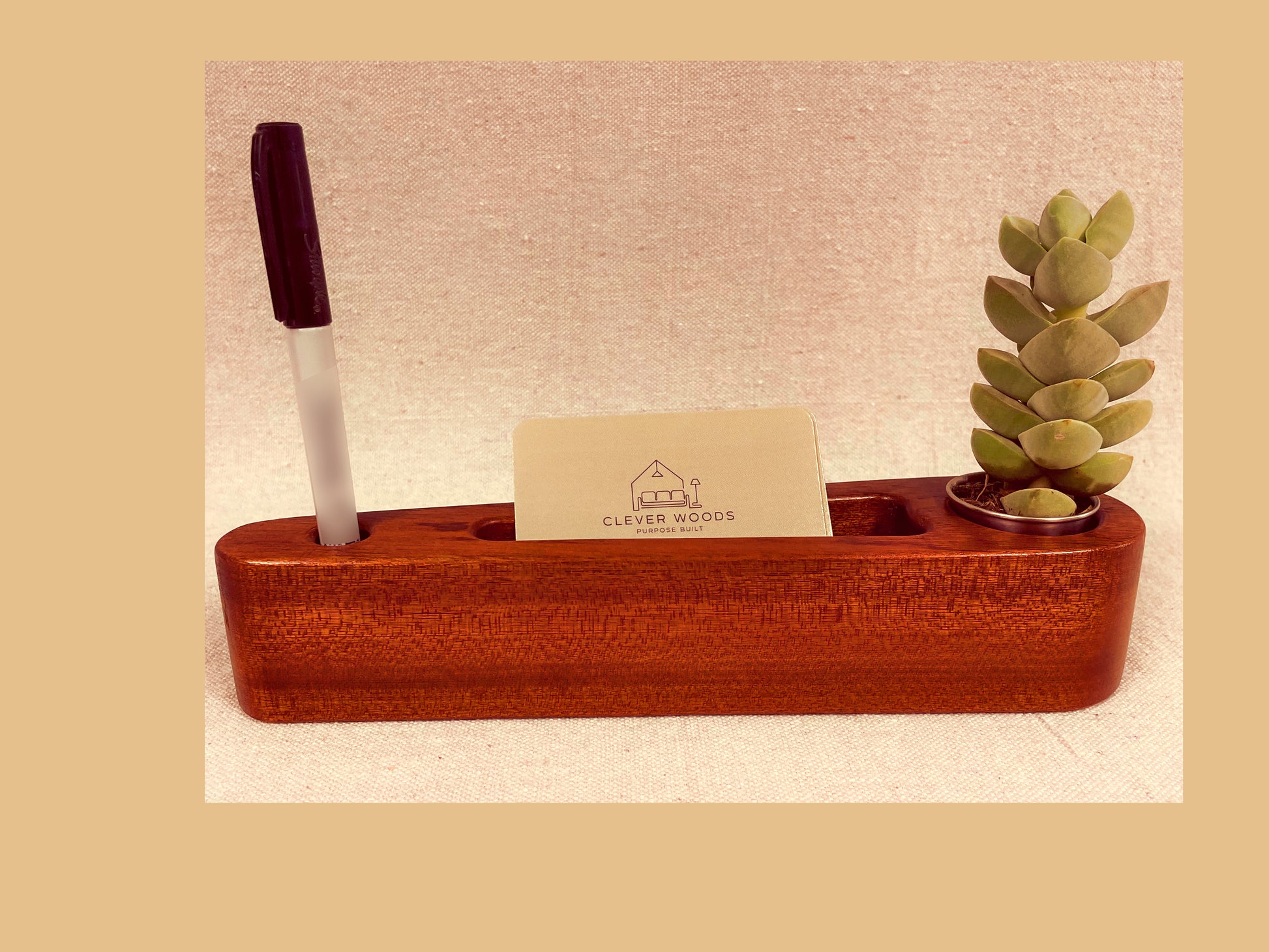 Solid sapele wood desk caddy with stainless planter cup, card slot, and pen holder