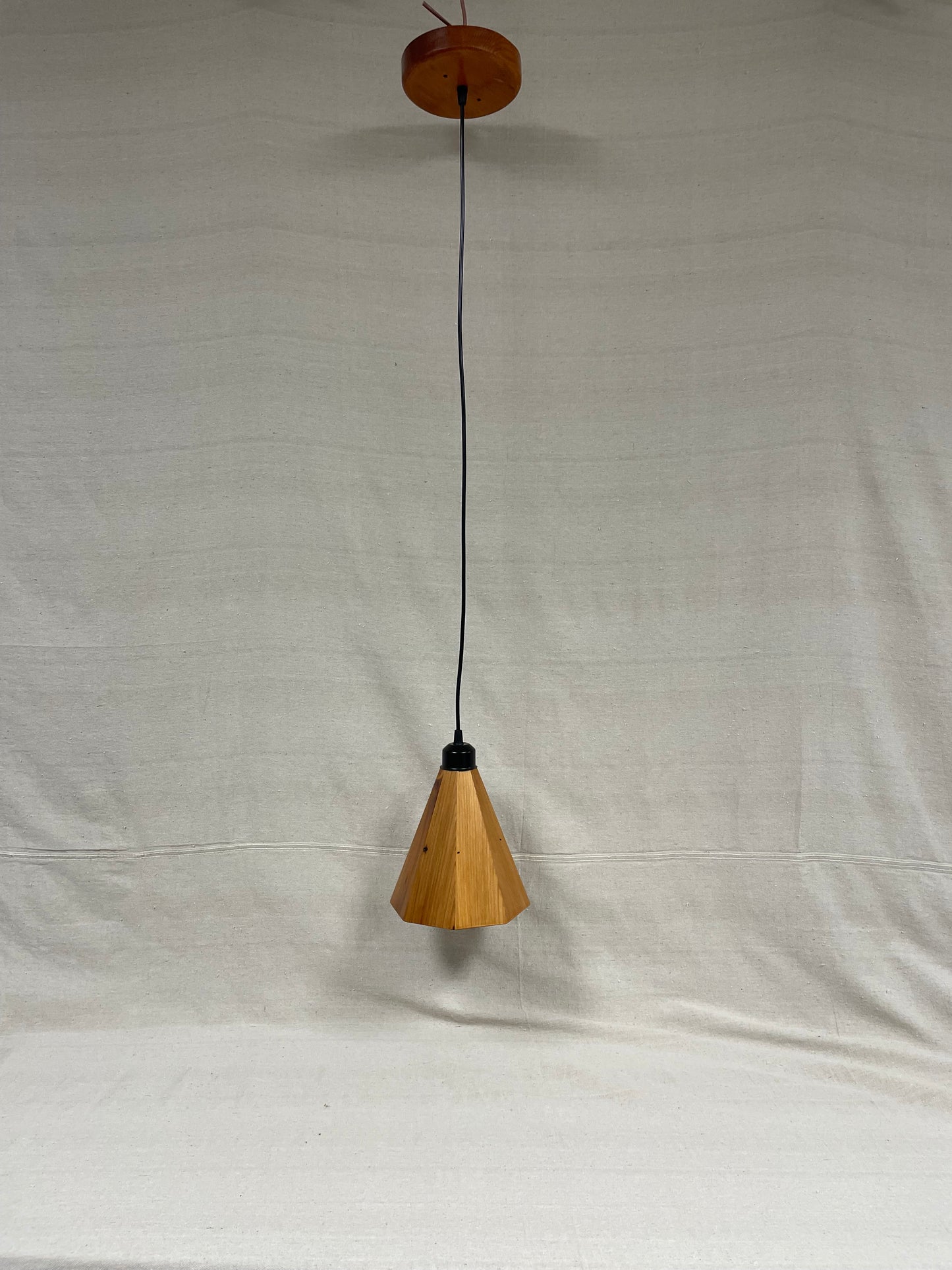 Douglas fir wood pendant light with octagonal shade and matching wood ceiling canopy