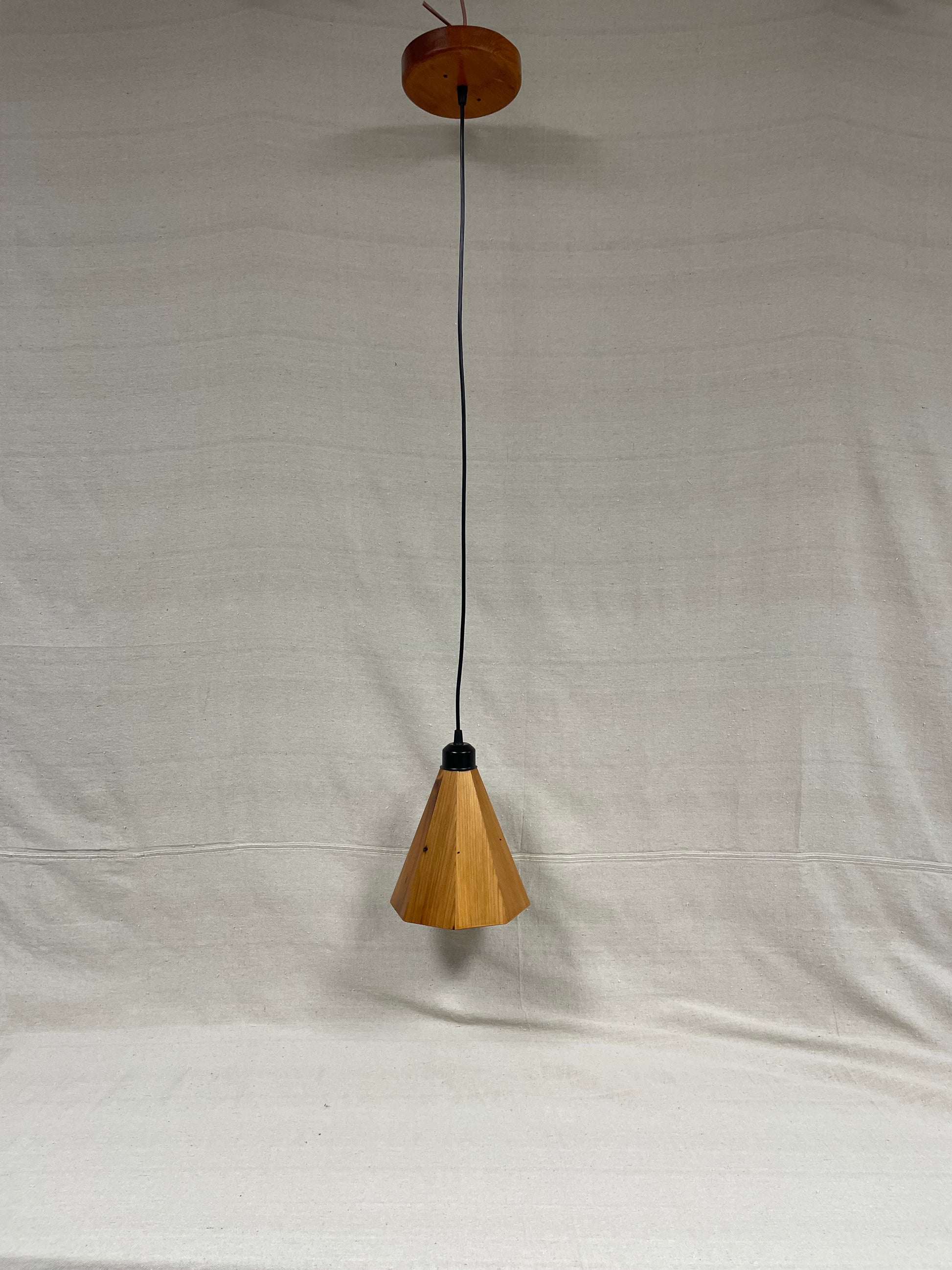 Douglas fir wood pendant light with octagonal shade and matching wood ceiling canopy